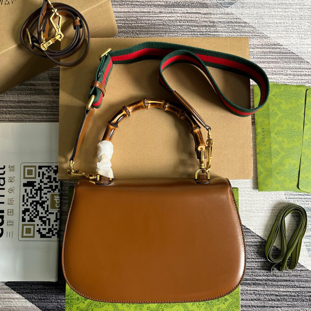 G*u*i bamboo 1947 medium top handle bag