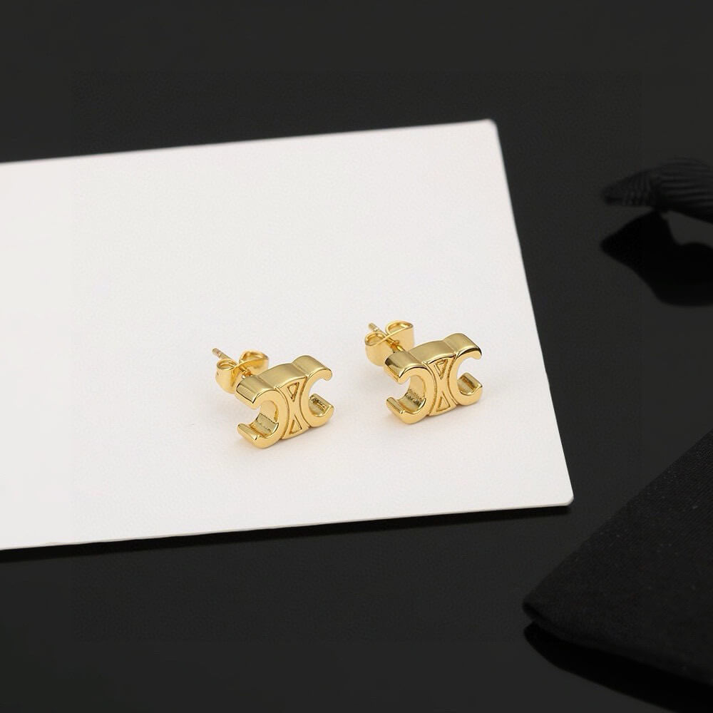 Ce**e triomphe studs in brass with gold finish
